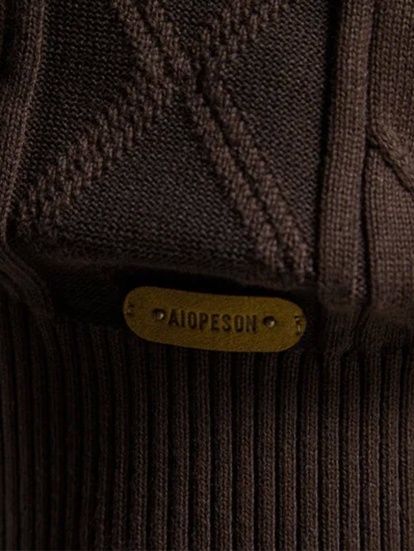 Geometrische Jacquard-Strickjacke mit Schalkragen