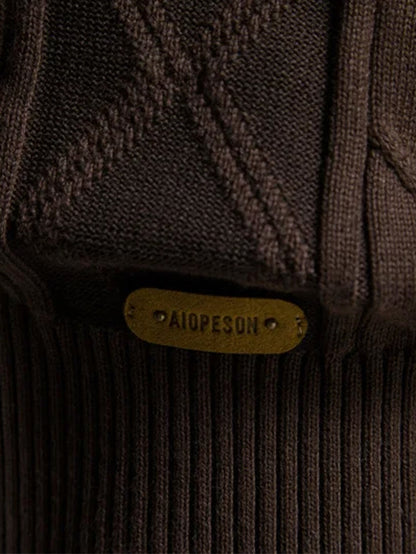 Geometrische Jacquard-Strickjacke mit Schalkragen