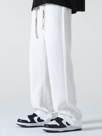 Gestreifte gerade Hose mit kariertem Design