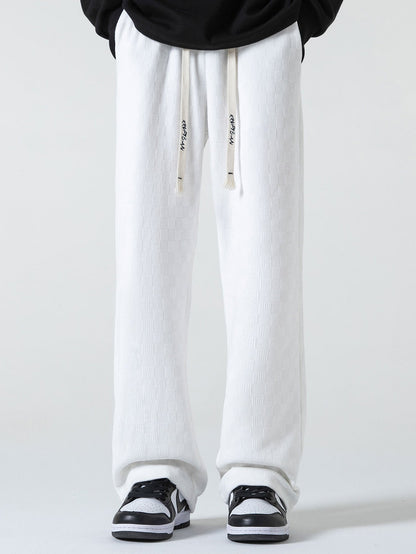 Gestreifte gerade Hose mit kariertem Design