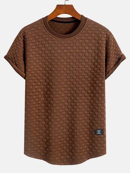 Jacquard T-Shirt mit Schachbrettmuster und Bogen-Saum
