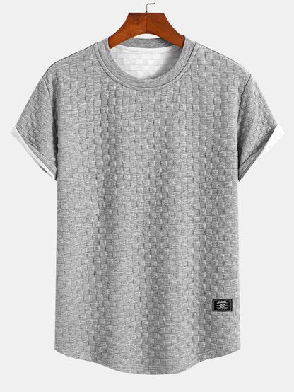 Jacquard T-Shirt mit Schachbrettmuster und Bogen-Saum