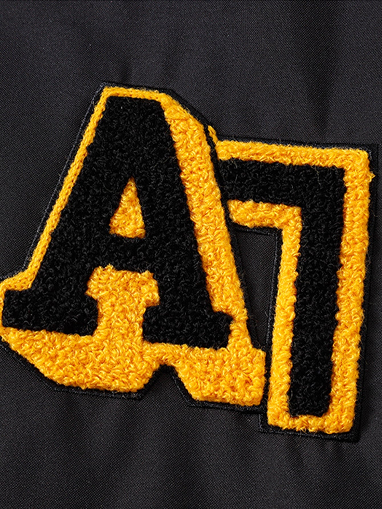 Baseballjacke im Locker-Schnitt mit kontrastierender Stickerei