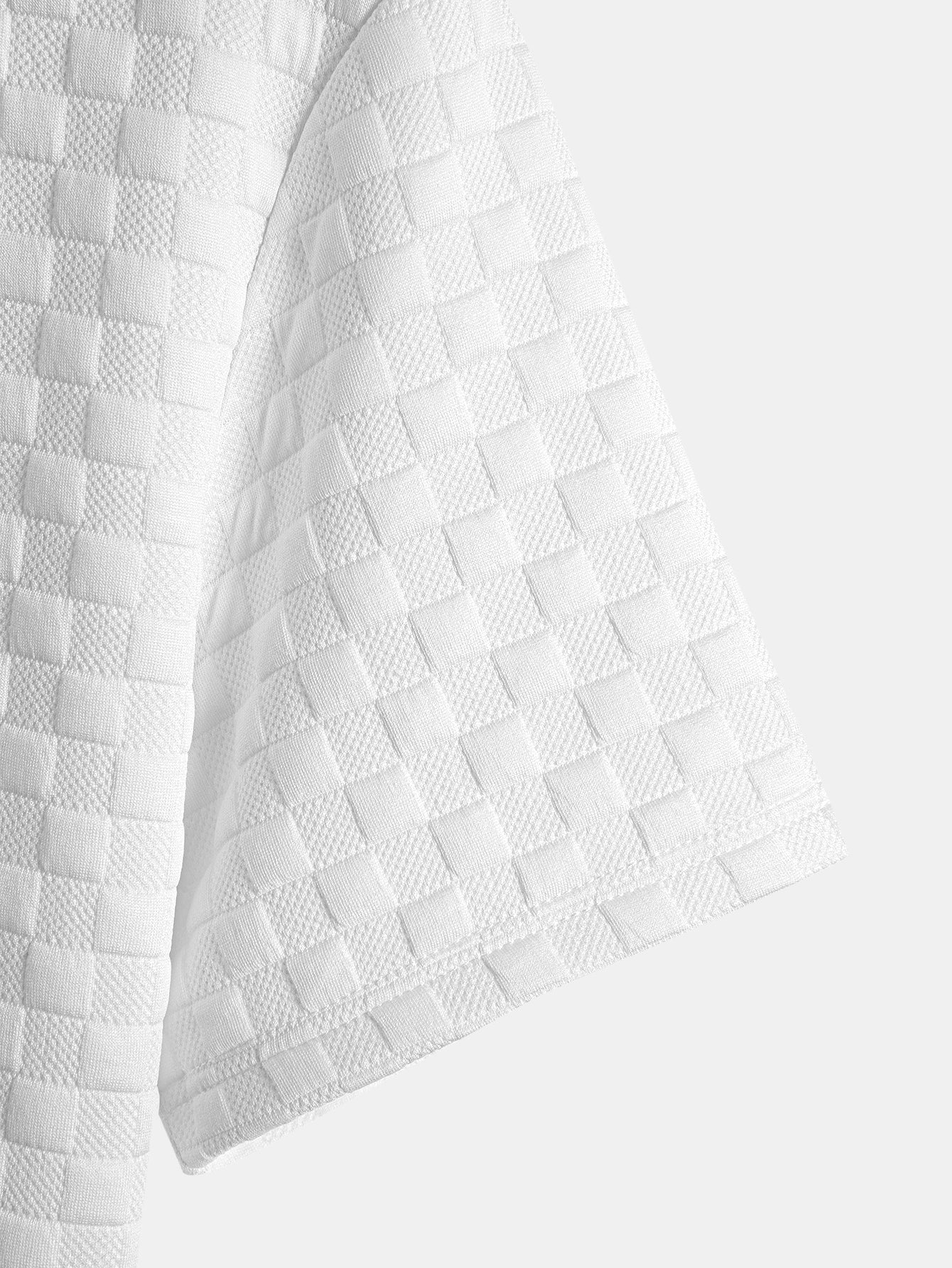 Jacquard T-Shirt mit Schachbrettmuster und Bogen-Saum