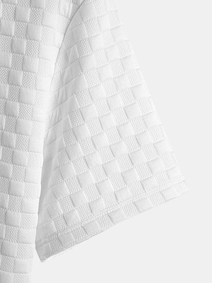 Jacquard T-Shirt mit Schachbrettmuster und Bogen-Saum