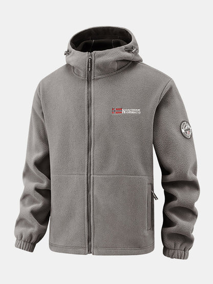 Fleecejacke mit Reißverschlusstasche und Kapuze