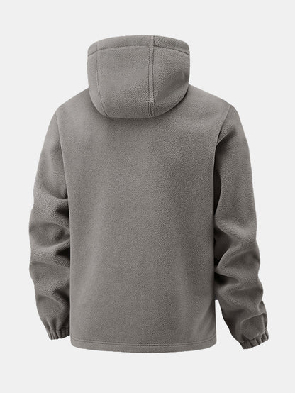 Fleecejacke mit Reißverschlusstasche und Kapuze