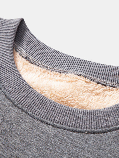 "Teddy Fleece Gefüttertes Sweatshirt" could be rewritten as "Gemütliches Teddy-Fleece Sweatshirt mit Futter".