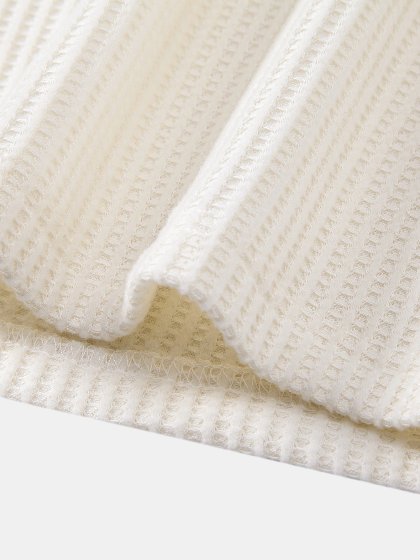 Langärmliges gestricktes Waffel-Poloshirt